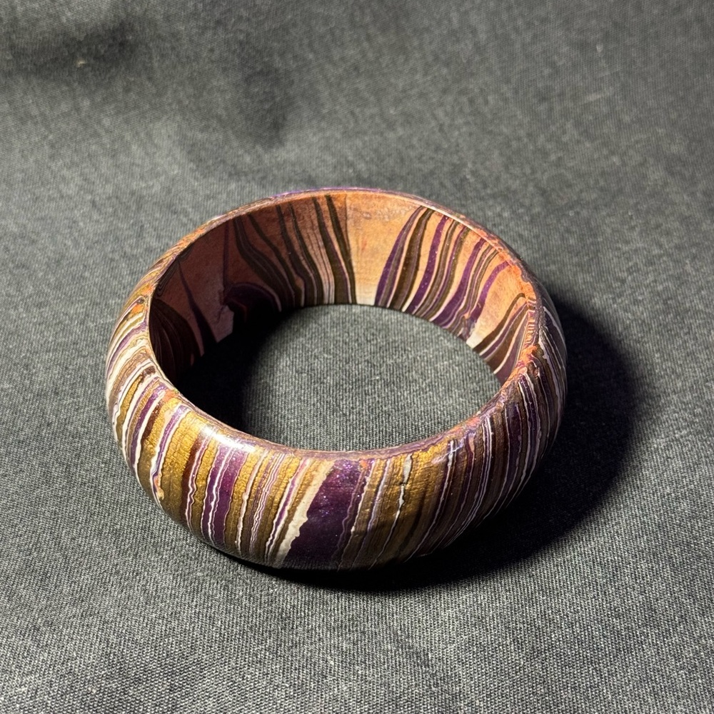 Indonesian hand made wooden bracelet, hand painted with golden sparkles